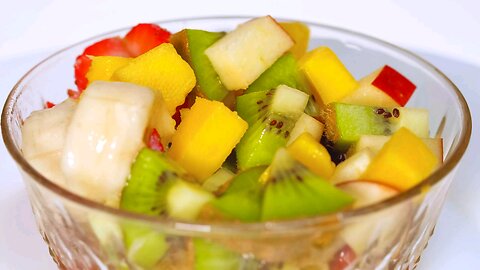 Rotating bowl with fruit on a white background