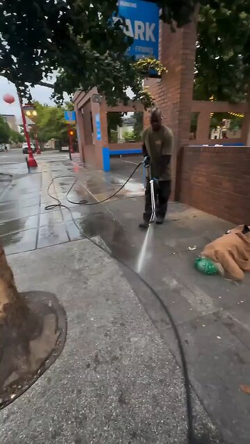 Power washing the Homeless away. I spent the night on the streets and at exactly 5 AM I