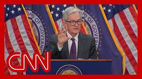 Fed holds interest rates steady despite pressure from Trump