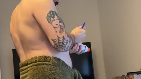 Man Pierces Spray Deodorant can