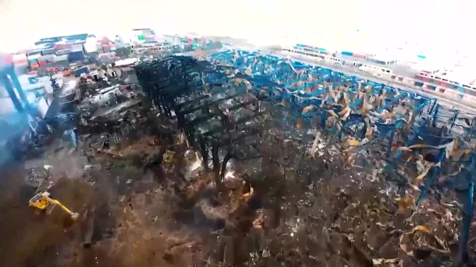 Drone video captures vast destruction at Iranian port after blast
