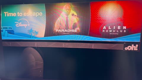 MK ultra billboard outside Brisbane Airport