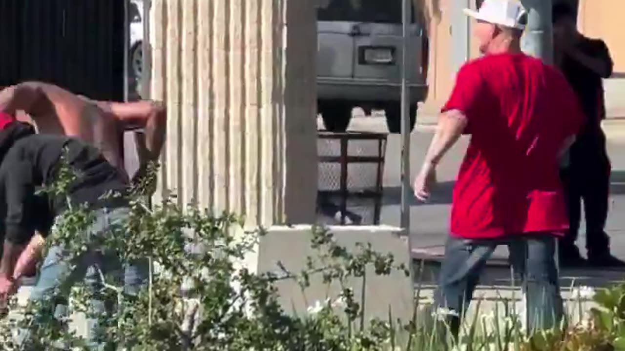 Bystander Beats Man Who Was Throwing Molotov Cocktail