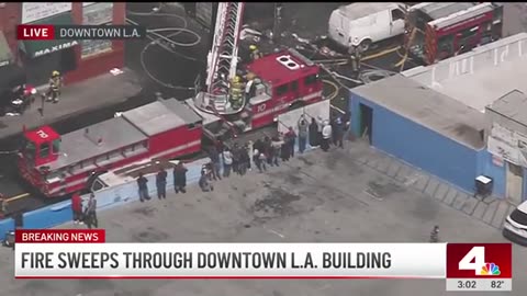 Nearly 100 firefighters battle commercial fire in Downtown LA