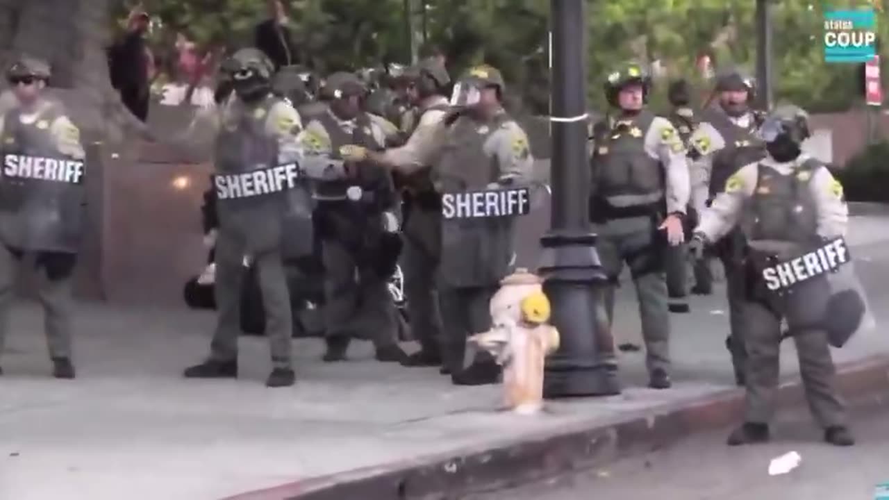 BREAKING_ 🚨 Rioter throws a bottle at LA County Sheriff