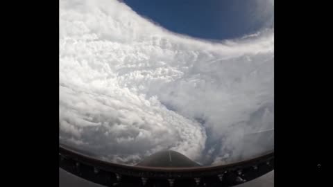 Incredible view from inside the storm’s eye. US Air Force flying in