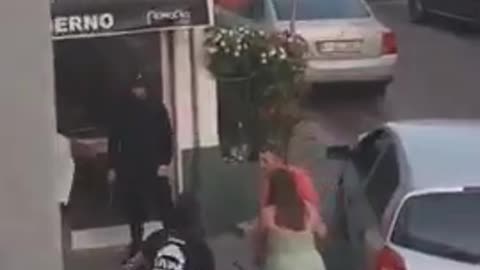 A woman in Portugal caught a full-blown street brawl on camera after a migrant pulled a knife