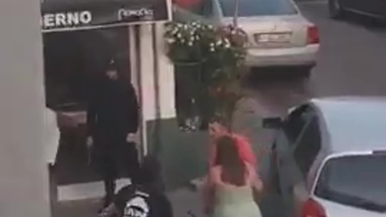 A woman in Portugal caught a full-blown street brawl on camera after a migrant pulled a knife