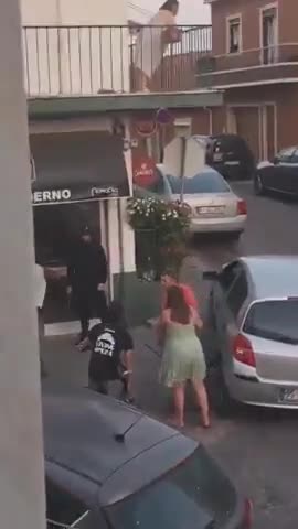 A woman in Portugal caught a full-blown street brawl on camera after a migrant pulled a knife