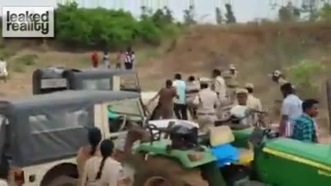 Female Cop Gets Hit By Sticks