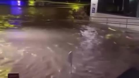 Flooding in Hilo, Hawaii as tsunami waves caused by the M8.8 earthquake