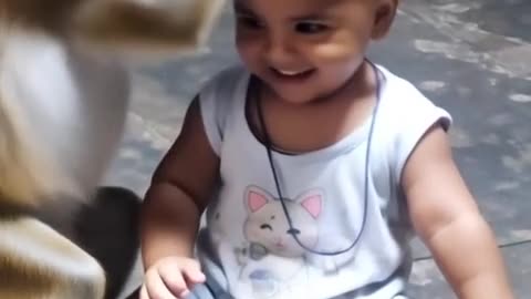 Cute baby and monkey.