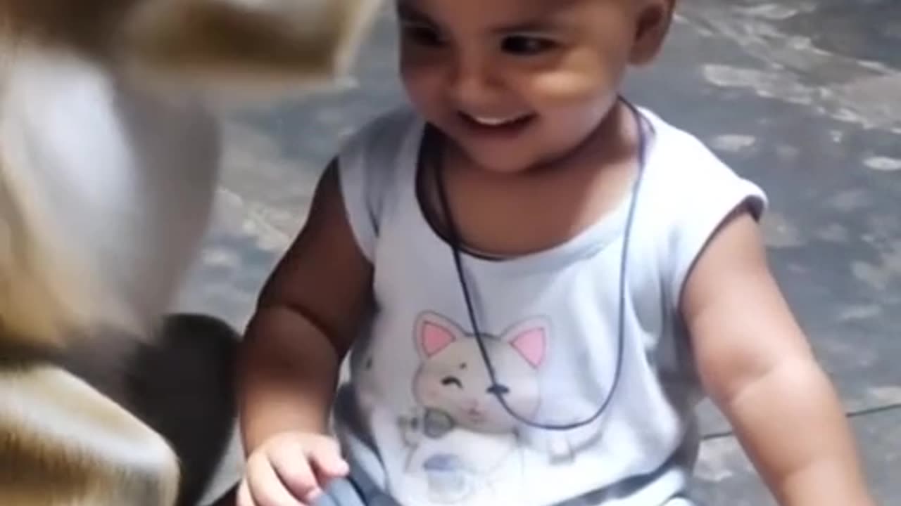 Cute baby and monkey.