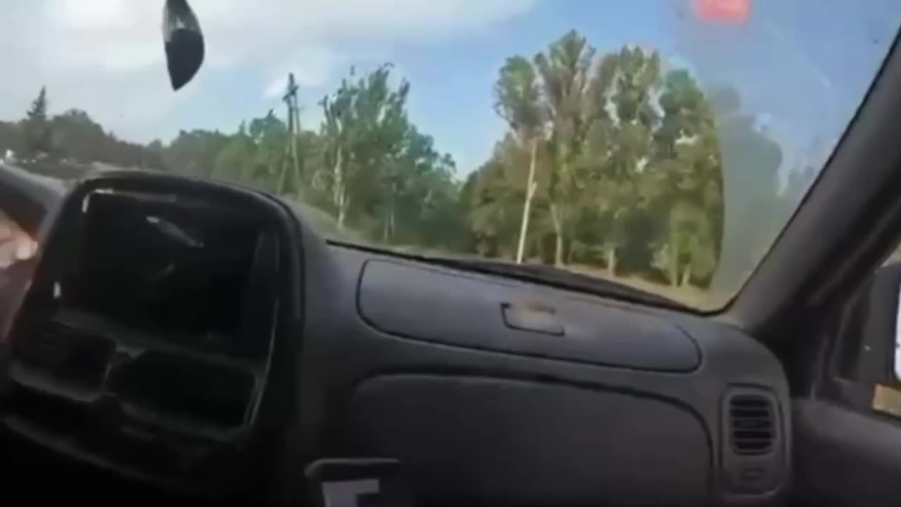 Ukrainian Soldiers Drive Through a Russian Ambush