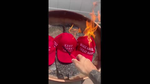 Man burns MAGA Hats. It's ovr. It America First hats on.