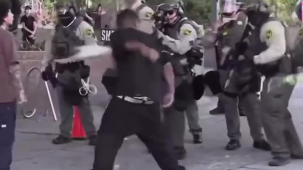 Patriot tackling a PHYCO ASSHOLE INVADER