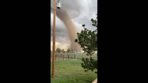 Large tornado on the ground near Bennett, Colorado