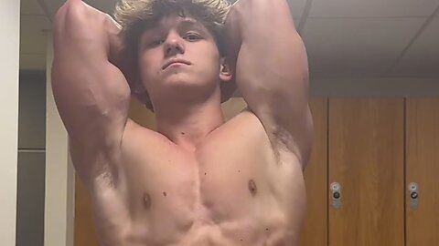 17 years old teen boy flexing muscles