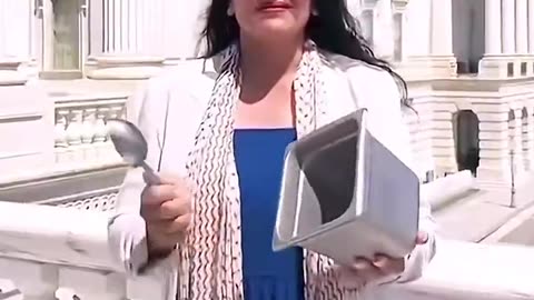 'Lunatic" Michigan Dem Rep. Rashida Tlaib beats a metal pan to show solidarity with Palestine.