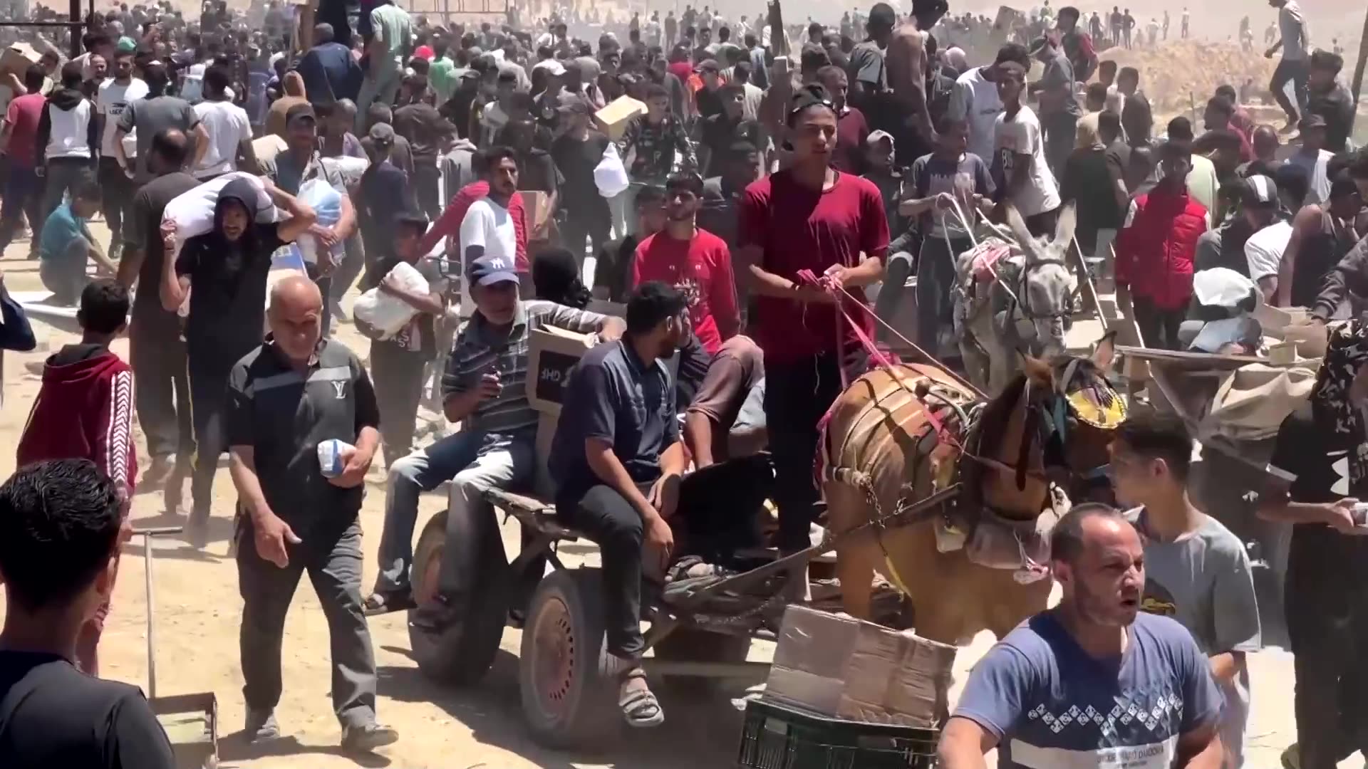 US group distributing aid in Gaza reopens sites after delays