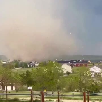 Large Tornado doing damage in Elkhorn Ranch, CO