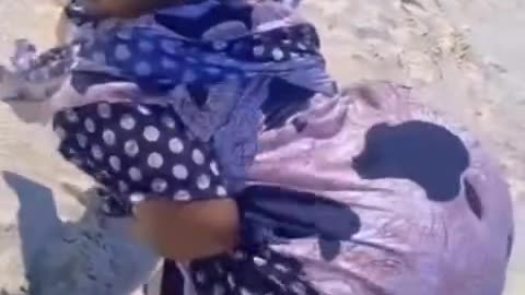 Big Booty Twerking on Fans at the beach.