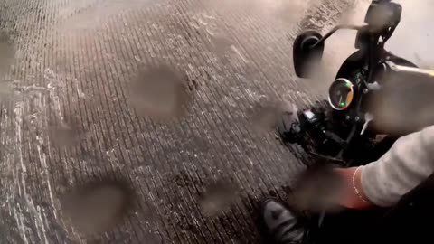 Motorcycle Slides Out From Rider On Wet Roads