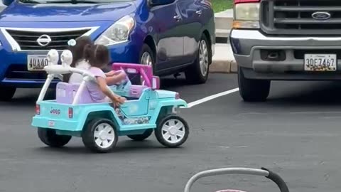 Girls Expertly Drift Toy Car In Parking Lot