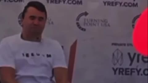Mystery Floating Red Dot on Shirt of Charlie Kirk