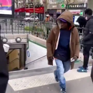 Migrant pushes White woman down stairs