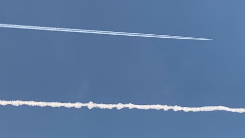 Airplanes & Plane Trails 8 - Spotting & watching long thick trails behind aircraft in hazy blue sky