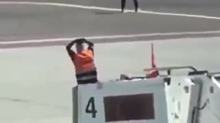 Man climbs into a plane's engine in Italy