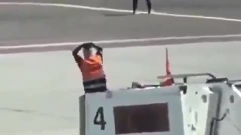 Man climbs into a plane's engine in Italy