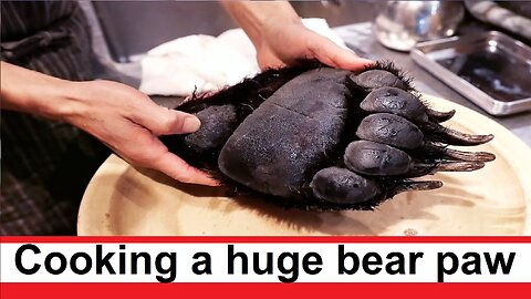 Cooking a huge bear paw is a signature dish