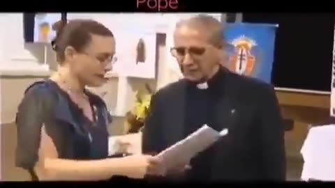 Woman confronts the Jesuit Black Pope.