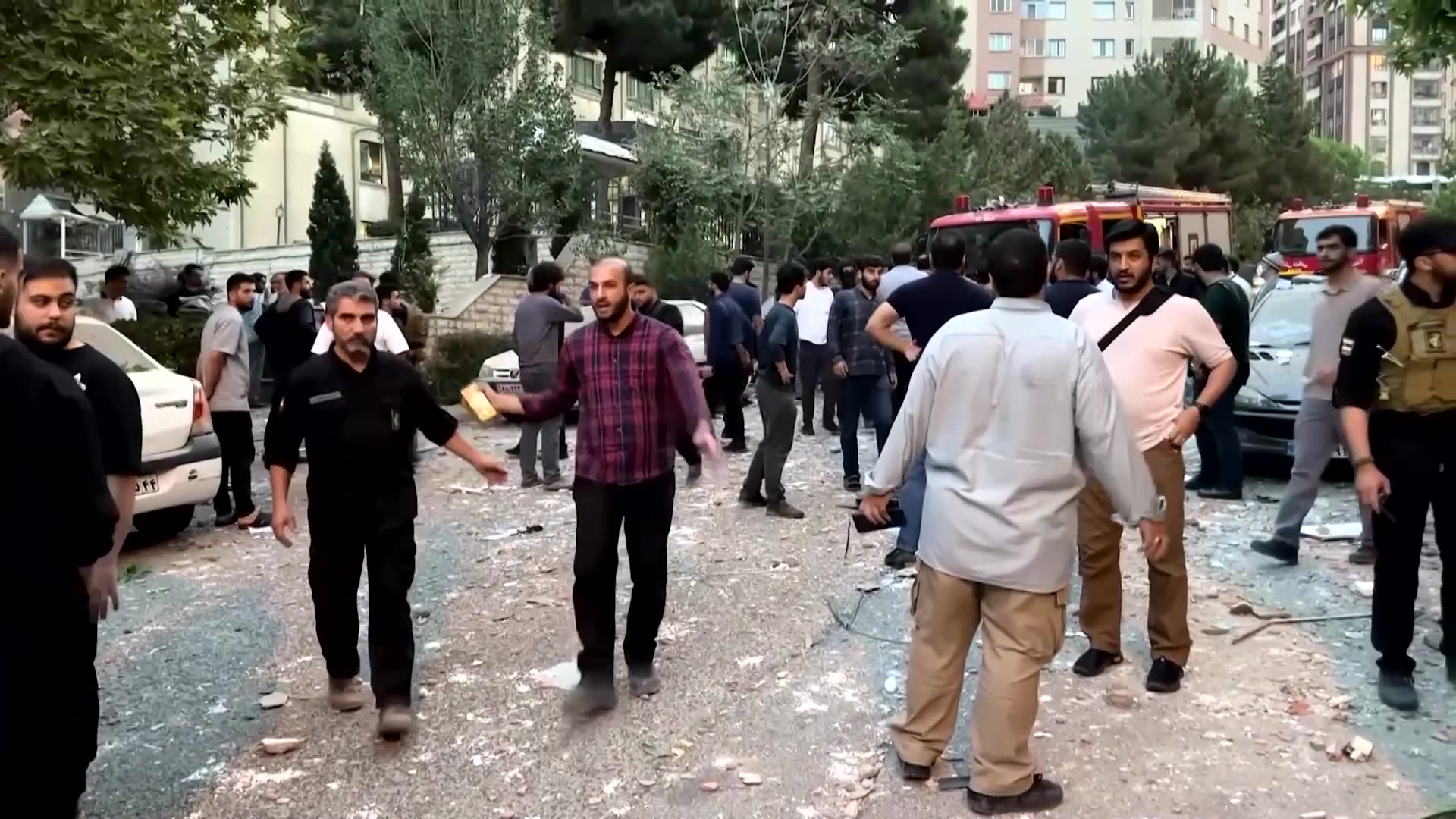 Iran state TV shows burning buildings after reported Israeli strikes