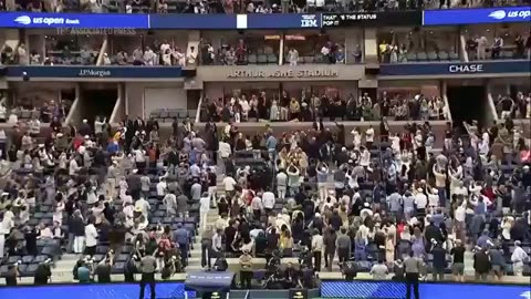 Trump receives a mix of cheers and boos as he attends the US Open