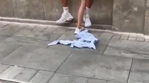 A woman in Spain stalks a random man.