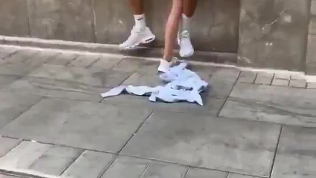 A woman in Spain stalks a random man.