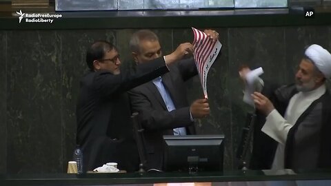 Iranian Parliament days ago. Burning a Flag.