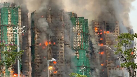 A fire has engulfed three skyscrapers in Hong Kong.