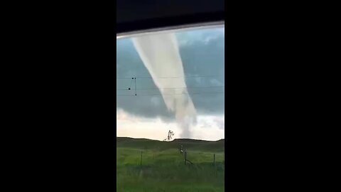 Todays Viral Clip: Summer Tornado shocks onlookers. (59 seconds)