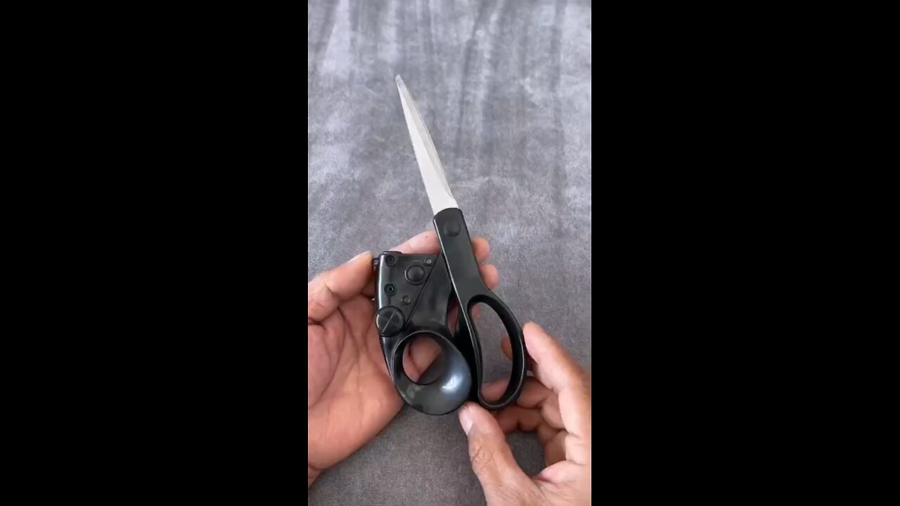 Scissors with laser