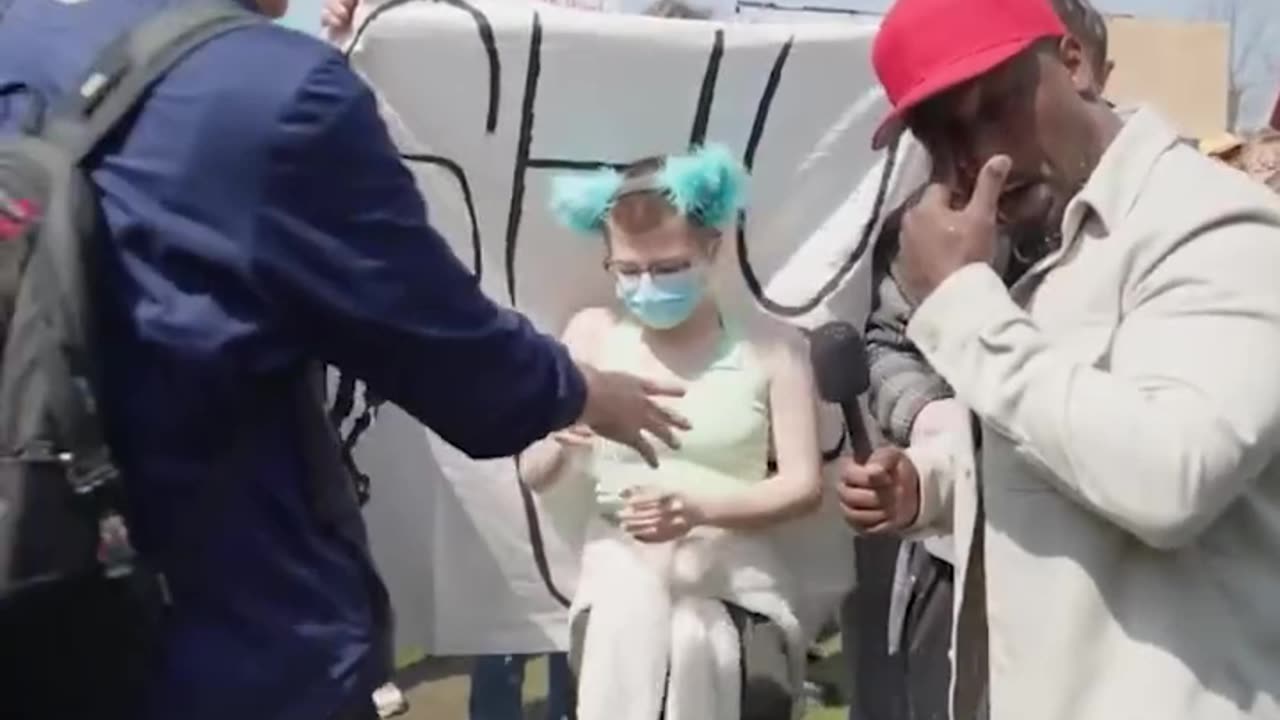 Far left masked individual resorts to violence