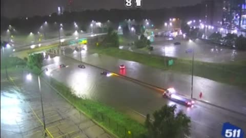 Video from Wisconsin DOT cameras shows stranded cars In Milwaukee from flooding