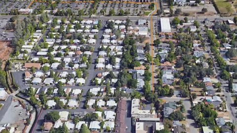 Redding officer shoots at suspect who drove towards him when escaping the parking lot