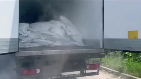 Refrigerator Trucks Full of Ukrainian KIA Wait at the Border