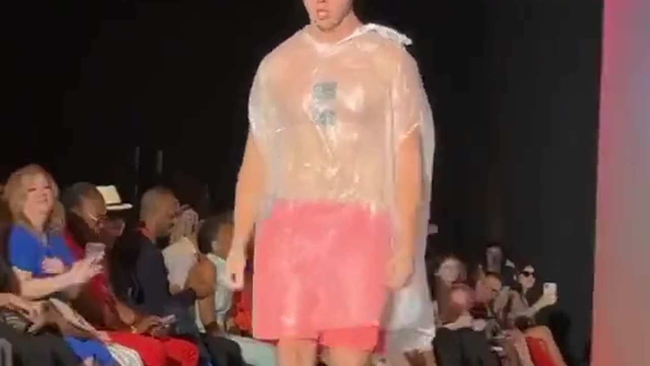 This man simply walked into the fashion show wearing a garbage bag