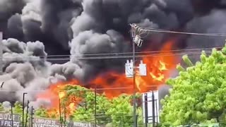 Massive fire breaks out with heavy plumes of smoke at industrial warehouse in Los Guayos, Venezuela,