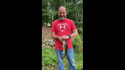 Bryan catches a bass using a plastic lizard lure
